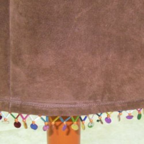 Vestido combinando telas indias y ante (detalle del bajo)
