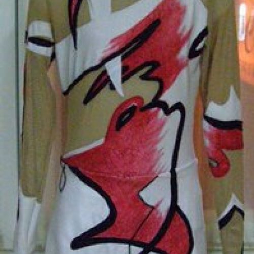 EN VENTA Diseño propio. Maillot para patinaje artístico. En lycra blanca y negra, con degradado en rojo pintado a mano. Delantero (confección en el año 2010)
